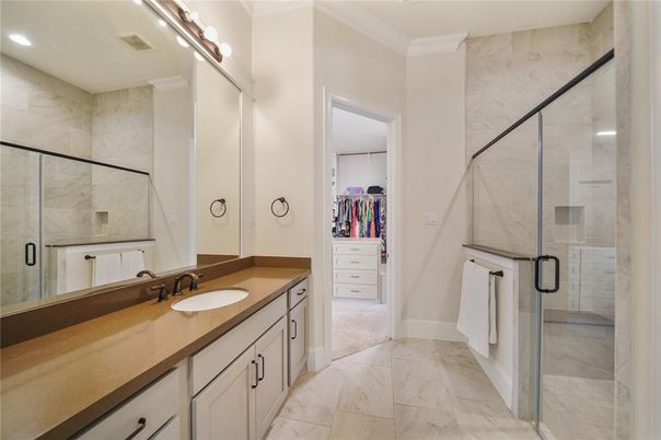 Bathroom, Dual Sink Vanities, Glass Shower, Interior, Marble, Marble Walls, Recessed Lighting