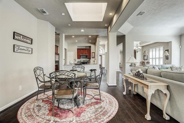 Chandelier, Dining room, Interior, Kitchen, Living room, Recessed Lighting, Stainless Steel Appliances, Wood Texture Flooring
