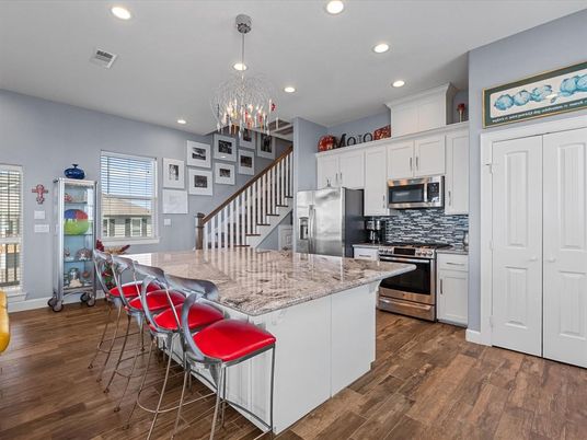 Chandelier, Interior, Kitchen, Pendant Lights, Recessed Lighting, Stainless Steel Appliances, Wood Texture Flooring