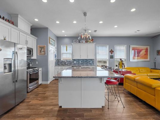Chandelier, Interior, Kitchen, Living room, Recessed Lighting, Stainless Steel Appliances, Wood Texture Flooring