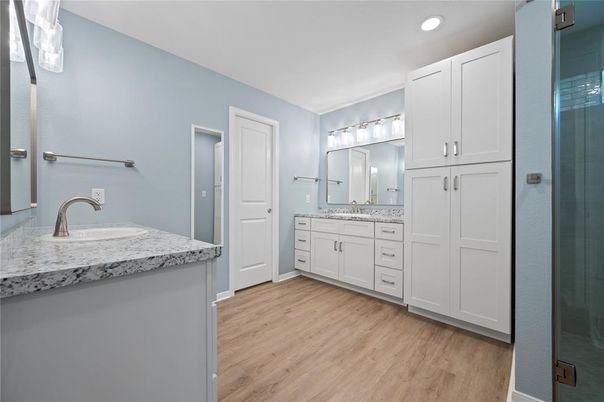 Bathroom, Dual Sink Vanities, Interior, Recessed Lighting, Wood Texture Flooring