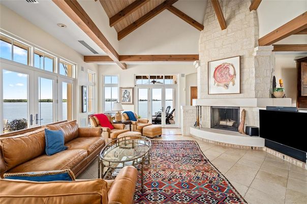Fireplace, Interior, Living room, Recessed Lighting, Water, Wooden Beams