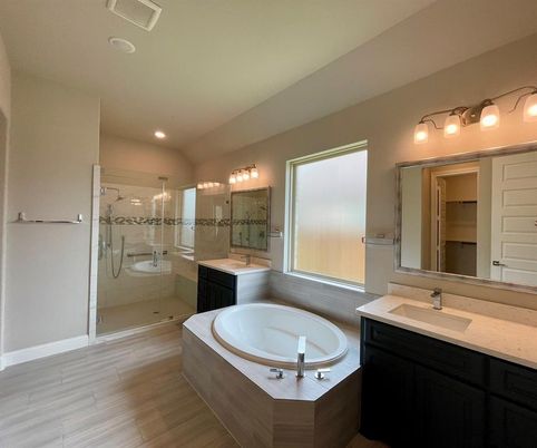 Bathroom, Dual Sink Vanities, Glass Shower, Interior, Recessed Lighting, Wood Texture Flooring