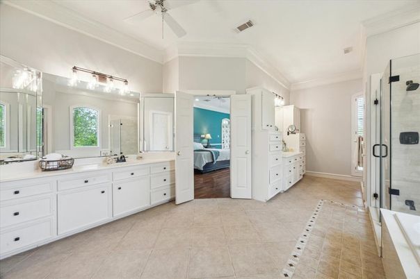 Bathroom, Bedroom, Dual Sink Vanities, Glass Shower, Interior, Wood Texture Flooring