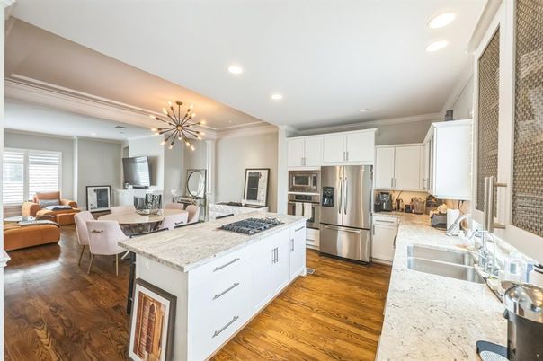 Dining room, Interior, Kitchen, Living room, Pendant Lights, Recessed Lighting, Stainless Steel Appliances, Wood Texture Flooring
