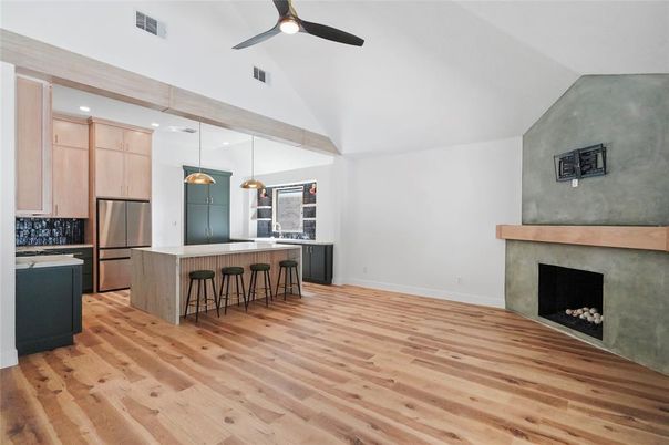Fireplace, Interior, Kitchen, Pendant Lights, Recessed Lighting, Stainless Steel Appliances, Wood Texture Flooring