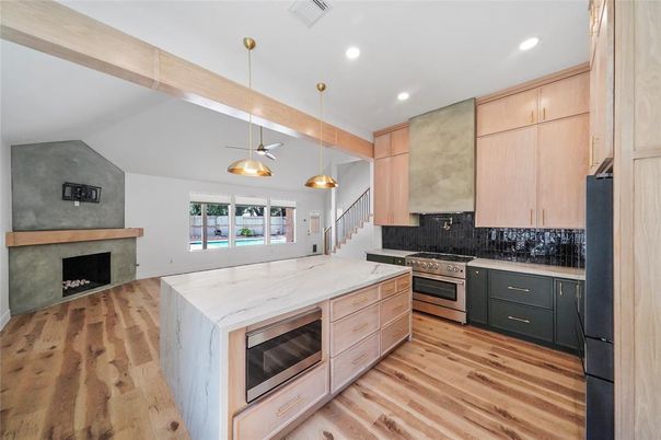 Fireplace, Interior, Kitchen, Pendant Lights, Recessed Lighting, Stainless Steel Appliances, Wood Texture Flooring