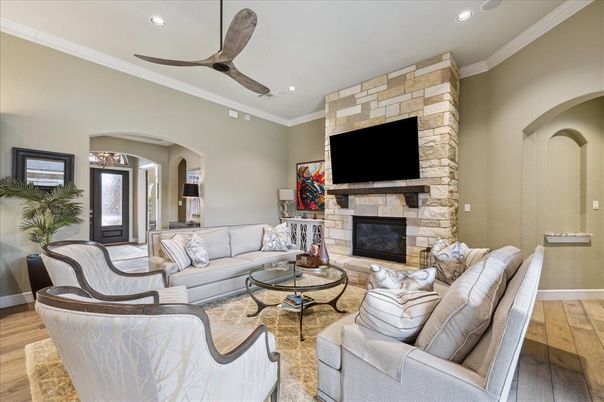 Fireplace, Interior, Living room, Recessed Lighting, Stone Walls, Wood Texture Flooring