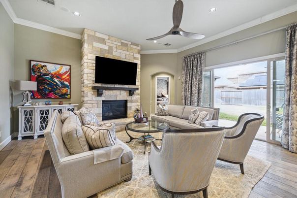Fireplace, Interior, Living room, Recessed Lighting, Stone Walls, Wood Texture Flooring