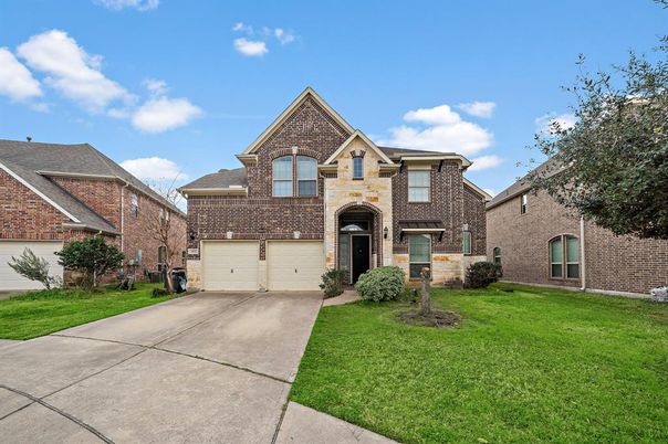 Attached, Exterior, Facade, Brick Facade, Brick Traditional