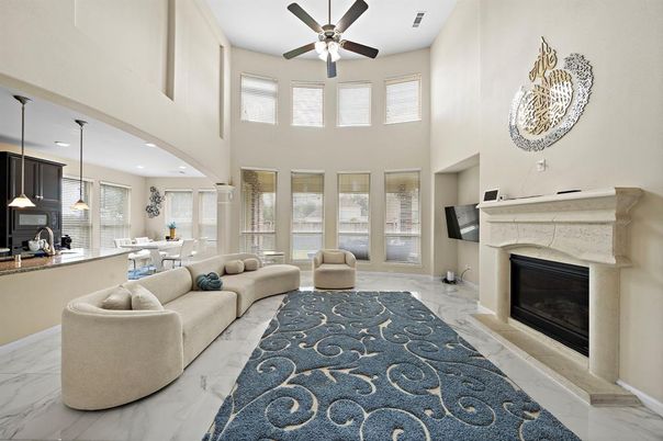 Dining room, Fireplace, Interior, Living room, Marble, Pendant Lights, Recessed Lighting