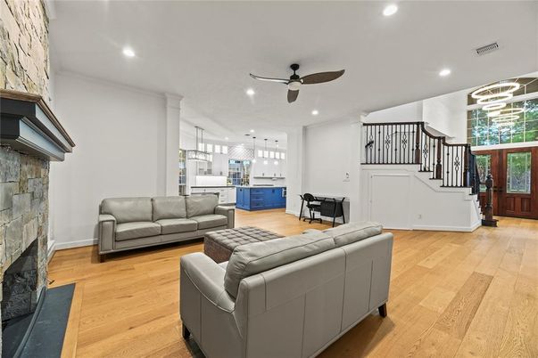 Fireplace, Interior, Kitchen, Living room, Pendant Lights, Recessed Lighting, Stone Walls, Wood Texture Flooring