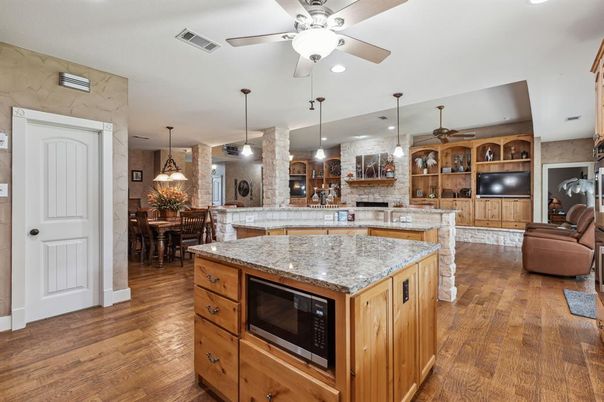 Dining room, Interior, Kitchen, Pendant Lights, Recessed Lighting, Stone Walls, Wood Texture Flooring