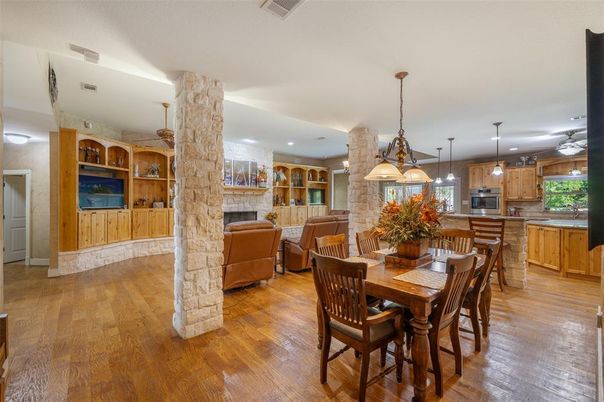 Dining room, Fireplace, Interior, Kitchen, Living room, Pendant Lights, Recessed Lighting, Stone Walls, Wood Texture Flooring