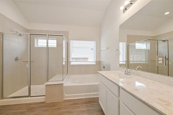 Bathroom, Dual Sink Vanities, Glass Shower, Interior, Recessed Lighting, Wood Texture Flooring