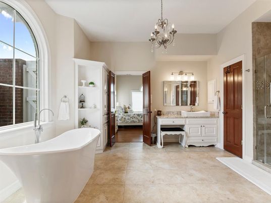 Bathroom, Chandelier, Dual Sink Vanities, Free Standing Baths, Glass Shower, Interior