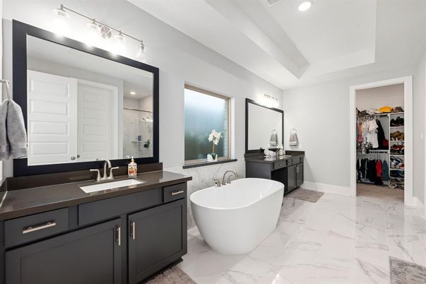 Bathroom, Dual Sink Vanities, Free Standing Baths, Interior, Marble, Recessed Lighting, Walk-in Closets