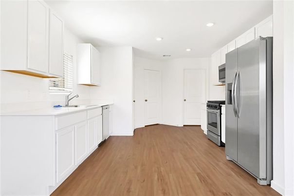 Interior, Kitchen, Recessed Lighting, Stainless Steel Appliances, Wood Texture Flooring