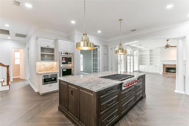 Fireplace, Interior, Kitchen, Pendant Lights, Recessed Lighting, Stainless Steel Appliances, Wood Texture Flooring