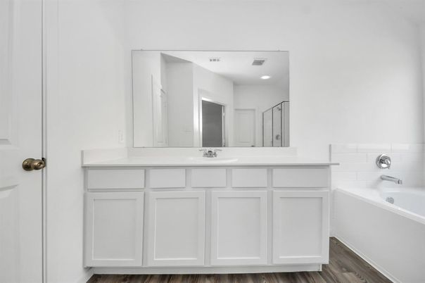 Bathroom, Dual Sink Vanities, Interior, Recessed Lighting, Wood Texture Flooring