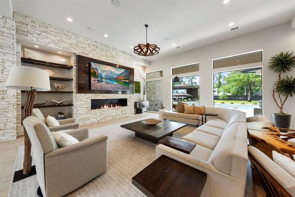 Fireplace, Interior, Living room, Pendant Lights, Recessed Lighting, Stone Walls, Wood Texture Flooring