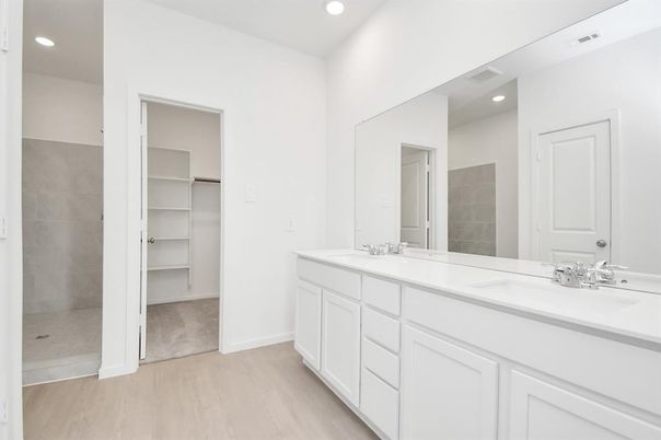 Bathroom, Dual Sink Vanities, Interior, Recessed Lighting, Walk-in Closets, Wood Texture Flooring