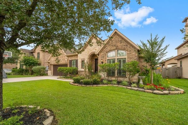 Attached, Backyard, Exterior, Facade, Brick Facade, Tudor Revival