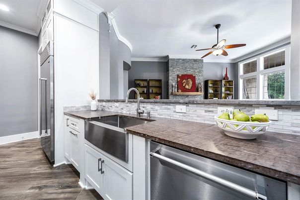 Interior, Kitchen, Recessed Lighting, Stainless Steel Appliances, Stone Walls, Wood Texture Flooring