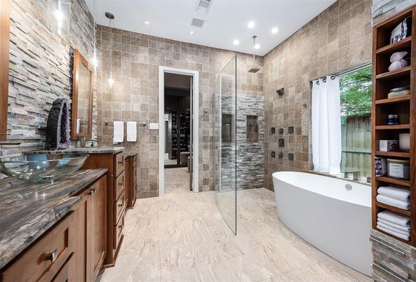 Bathroom, Dual Sink Vanities, Free Standing Baths, Glass Shower, Interior, Recessed Lighting, Stone Walls