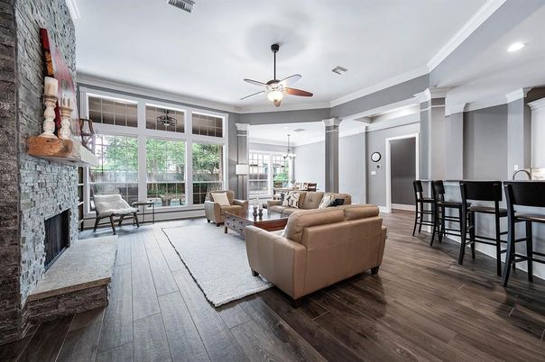 Fireplace, Interior, Living room, Pendant Lights, Recessed Lighting, Stone Walls, Wood Texture Flooring