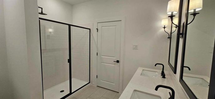 Bathroom, Dual Sink Vanities, Glass Shower, Interior, Wood Texture Flooring