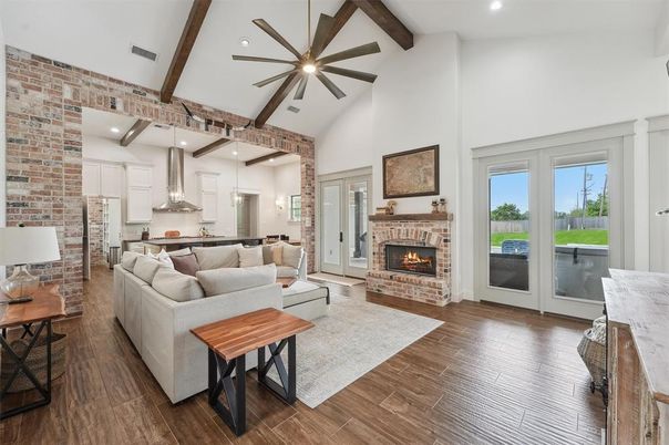Fireplace, Interior, Kitchen, Living room, Pendant Lights, Recessed Lighting, Stainless Steel Appliances, Stone Walls, Wooden Beams, Wood Texture Flooring
