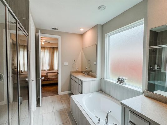 Bathroom, Dual Sink Vanities, Interior, Recessed Lighting, Wood Texture Flooring