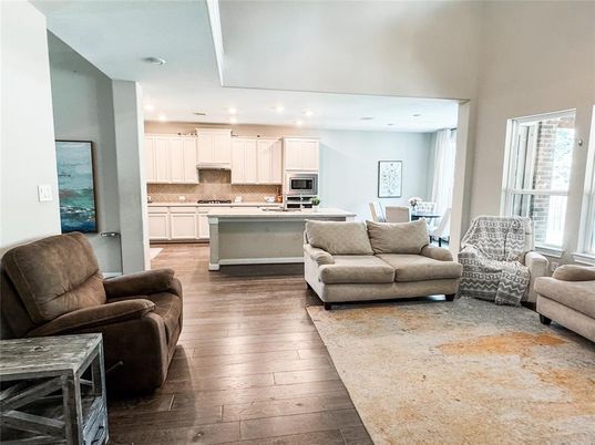 Dining room, Interior, Kitchen, Living room, Recessed Lighting, Stainless Steel Appliances, Wood Texture Flooring