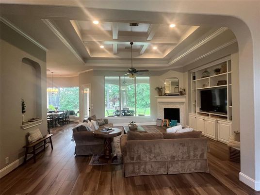 Dining room, Fireplace, Interior, Living room, Pendant Lights, Recessed Lighting, Wood Texture Flooring