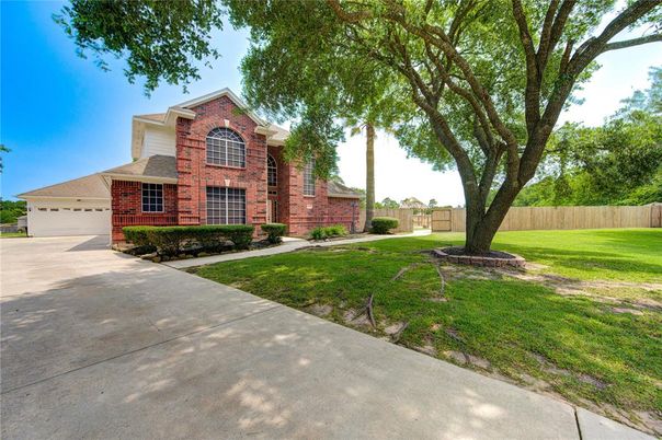 Attached, Backyard, Exterior, Facade, Brick Facade, Brick Traditional