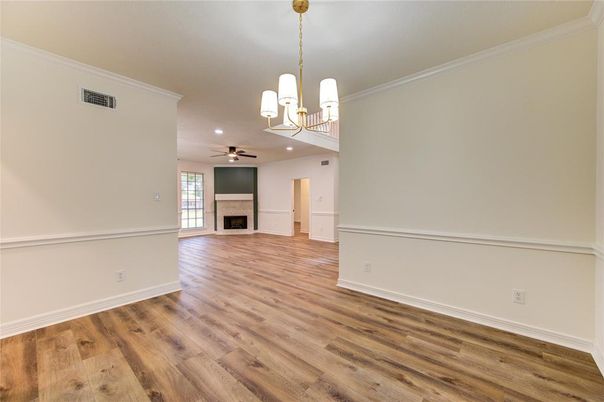 Chandelier, Empty room, Fireplace, Interior, Pendant Lights, Recessed Lighting, Wood Texture Flooring