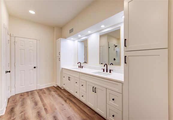 Bathroom, Dual Sink Vanities, Interior, Recessed Lighting, Wood Texture Flooring
