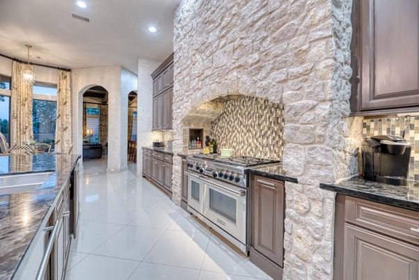 Interior, Kitchen, Pendant Lights, Recessed Lighting, Stainless Steel Appliances, Stone Walls