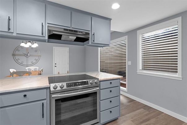 Interior, Kitchen, Recessed Lighting, Stainless Steel Appliances, Wood Texture Flooring