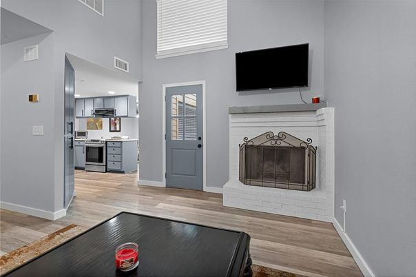 Fireplace, Interior, Kitchen, Recessed Lighting, Wood Texture Flooring