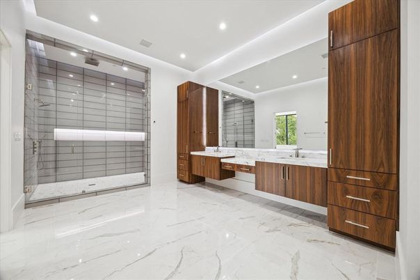 Bathroom, Dual Sink Vanities, Glass Shower, Interior, Marble, Recessed Lighting