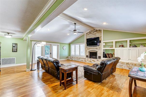 Fireplace, Interior, Living room, Recessed Lighting, Stone Walls, Wood Texture Flooring