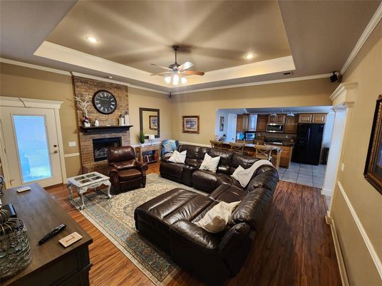 Fireplace, Interior, Kitchen, Living room, Recessed Lighting, Stone Walls, Wood Texture Flooring