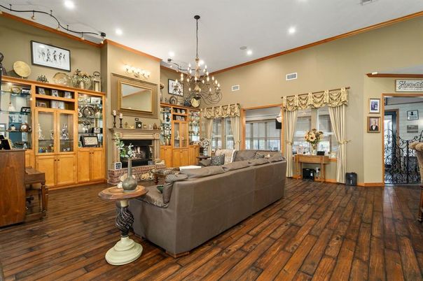 Chandelier, Fireplace, Interior, Living room, Recessed Lighting, Wood Texture Flooring