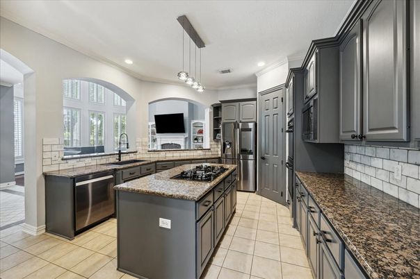 Fireplace, Interior, Kitchen, Pendant Lights, Recessed Lighting, Stainless Steel Appliances