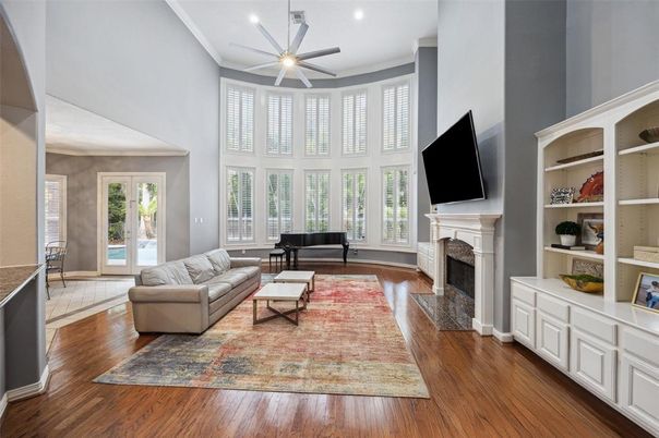 Fireplace, Interior, Living room, Piano, Recessed Lighting, Wood Texture Flooring