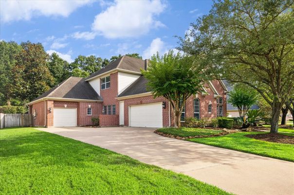 Attached, Backyard, Exterior, Facade, Brick Facade, Brick Traditional