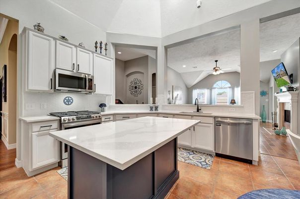 Fireplace, Interior, Kitchen, Recessed Lighting, Stainless Steel Appliances