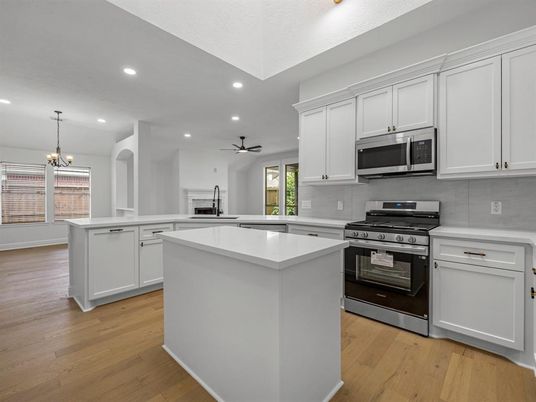 Chandelier, Interior, Kitchen, Pendant Lights, Recessed Lighting, Stainless Steel Appliances, Wood Texture Flooring